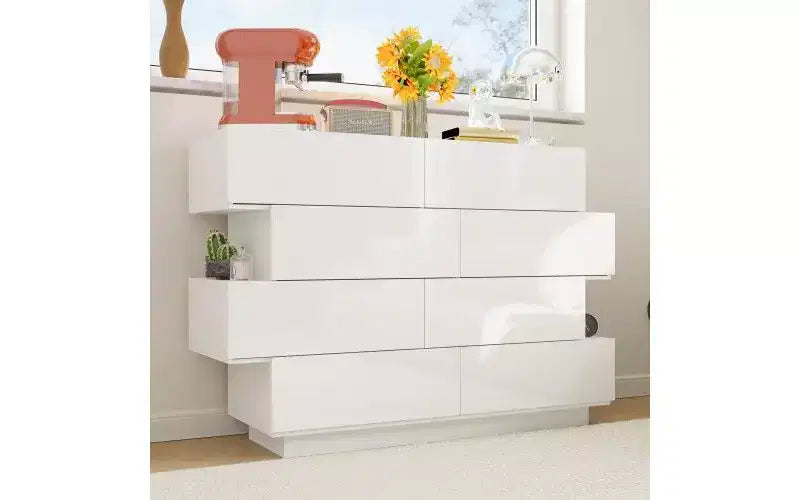Cassettiera bianca dal design creativo, struttura asimmetrica, 8 cassetti