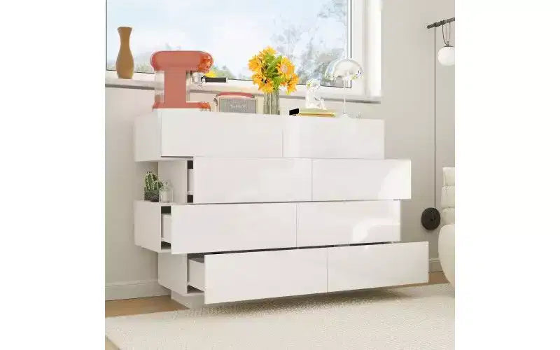 Cassettiera bianca dal design creativo, struttura asimmetrica, 8 cassetti